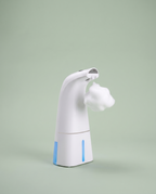 Tersella Pure, dispensador de jabón automático con espuma, sobre fondo salvia