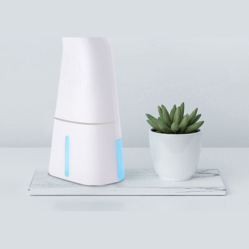 Tersella Pure en el lavabo junto a una planta